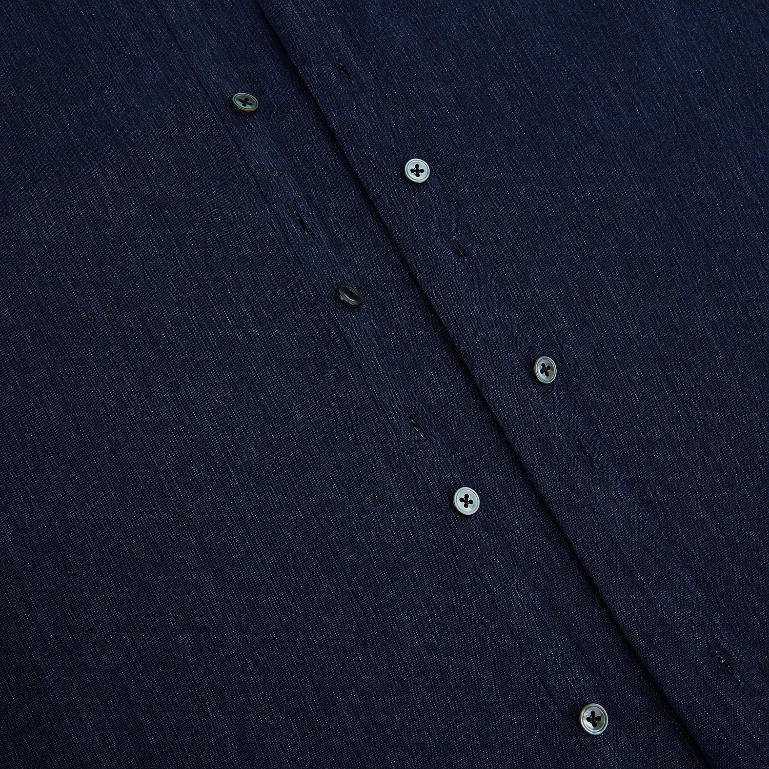 View 7 of product The Navy Linen Westminster Shirt by Turnbull & Asser features a classic collar and buttoned cuffs, exemplifying British craftsmanship. Shown here in long sleeves, the shirt is displayed flat against a white background.