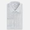 View 5 of product The Turnbull & Asser Navy and Blue Multi Grid Check Mayfair Shirt is a long-sleeve, button-up Italian cotton shirt with a collar and cuffs, featuring a blue grid check pattern, shown against a plain white background.