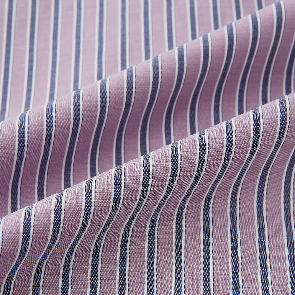 The Turnbull & Asser Antique Pink Ticking Stripe Westminster Shirt is a collared, long-sleeve button-up with thin vertical pink stripes on white, highlighting British craftsmanship. It’s shown neatly laid flat and fully buttoned.