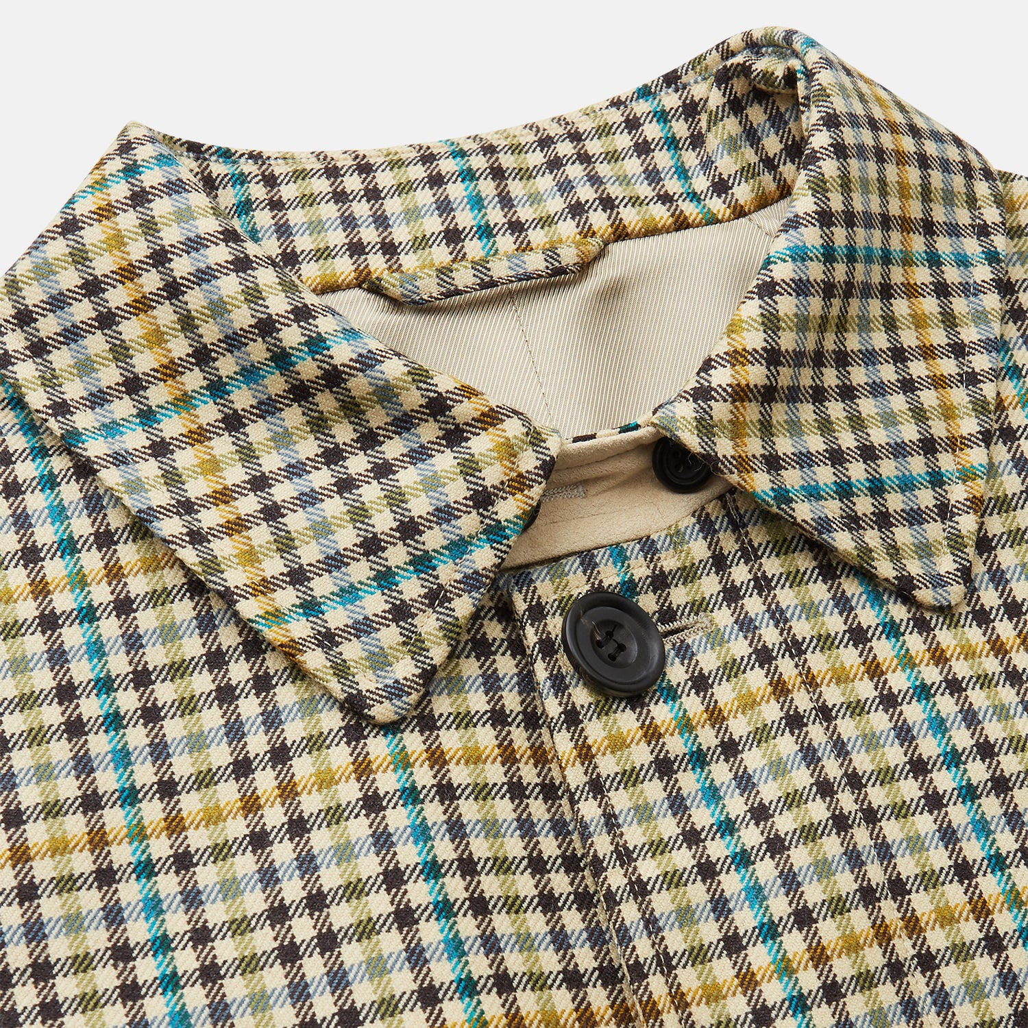 View 2 of product The Turnbull & Asser Green and Blue Multi Check Wool Elliot Coat is a men’s knee-length, long-sleeved overcoat with a collar and button-up front, crafted from Scottish wool in a check plaid pattern, shown on a white background.