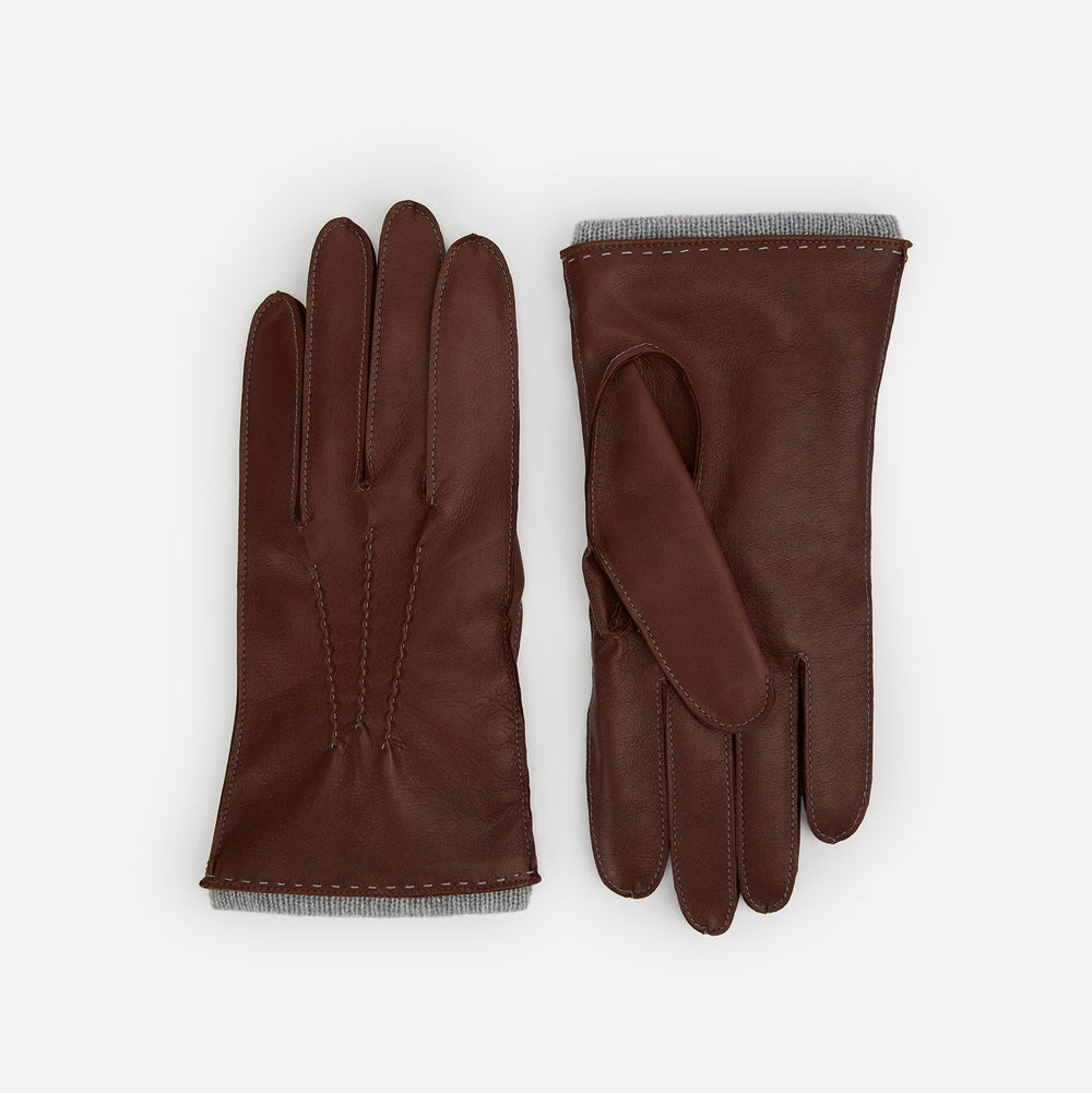 Turnbull & Asser's Dark Chocolate/Grey Cashmere-Lined Hairsheep Leather Gloves are shown on a white background, with one glove displaying the palm and the other the back.