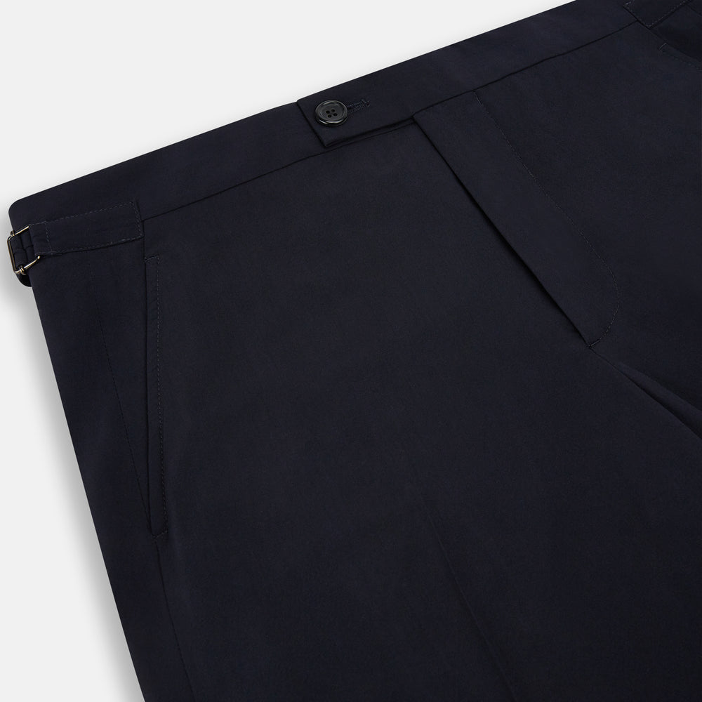 A pair of Midnight Blue Wool Henry Trousers by Turnbull & Asser, with a button closure and straight legs, shown against a plain white background.