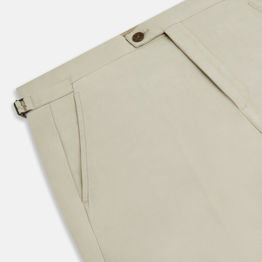 Turnbull & Asser Taupe Cotton Blend Henry Trousers with a straight-leg formal cut, button and zipper closure, belt loops, and side pockets, shown against a plain white background.