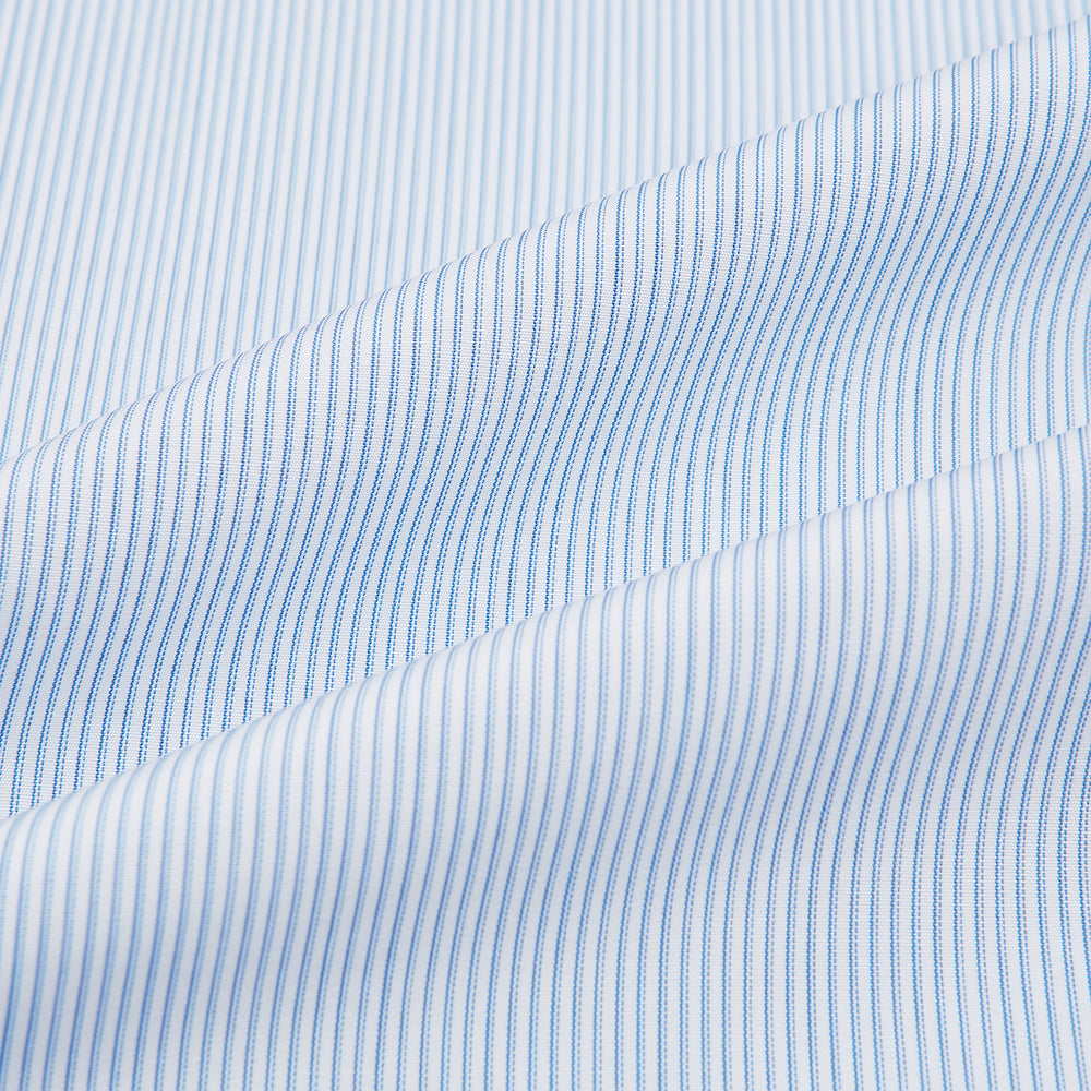 The Sky Blue Hairline Multi Stripe Mayfair Shirt by Turnbull & Asser, made from Italian cotton with a classic collar, white buttons, and buttoned cuffs, is displayed on a plain white background—an essential for any gentleman.