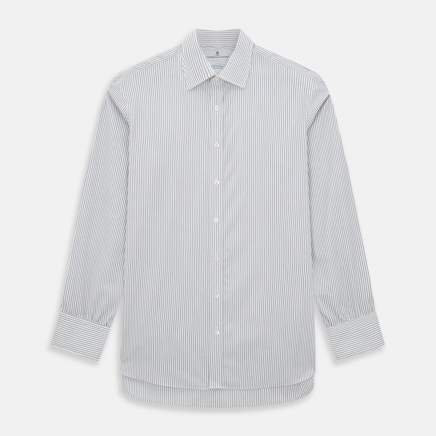 View 1 of product The Navy Music Stripe Mayfair Shirt by Turnbull & Asser features thin vertical blue and white stripes, a classic T&A collar, and long sleeves, shown on a plain white background.