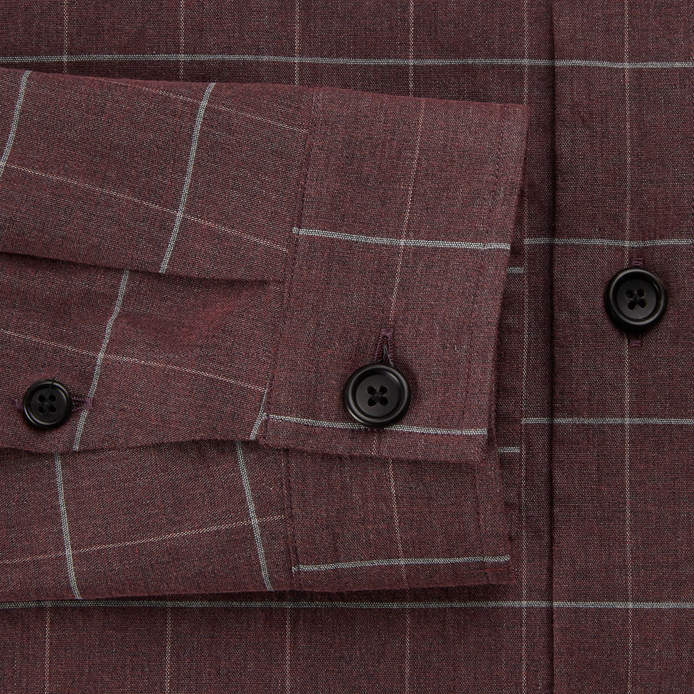 The Turnbull & Asser Burgundy Check Hampstead Overshirt, featuring a button-up front, collar, white windowpane pattern, and two front pockets, is laid flat on a white background—perfect for elegant formal wear.