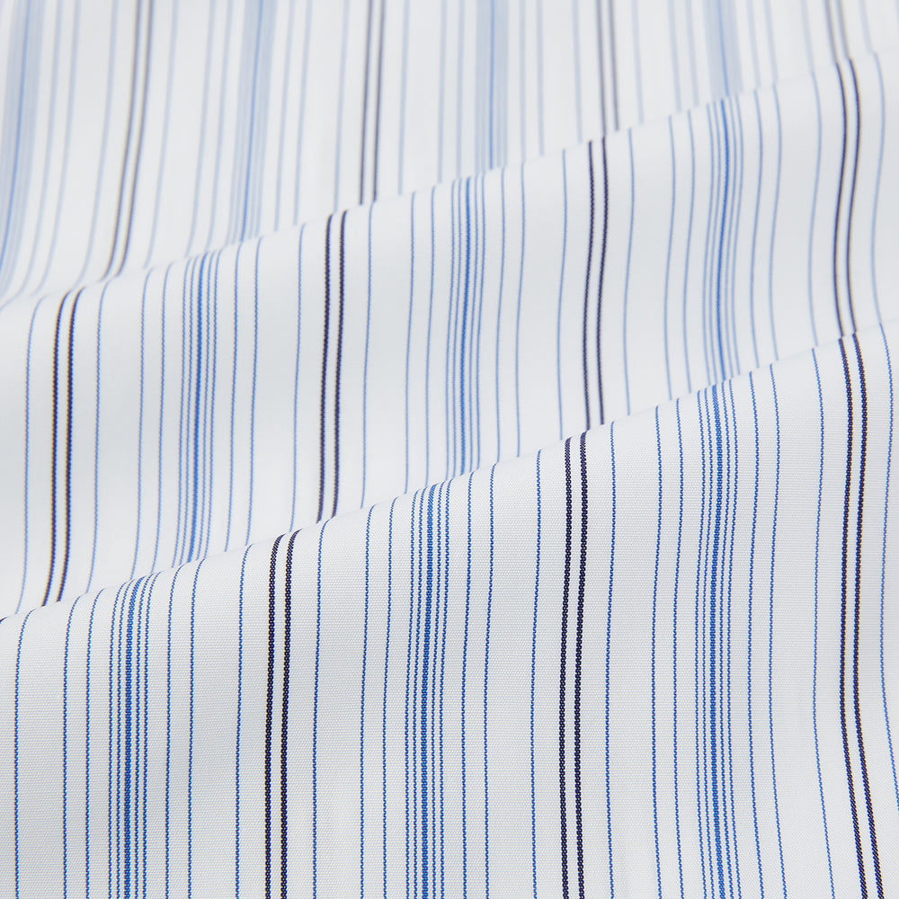 The Turnbull & Asser Navy and Blue Multi Stripe Mayfair Shirt features long sleeves, a T&A collar, and buttoned cuffs, shown against a white background.