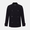 View 1 of product The Navy Kingston Corduroy Caban Jacket by Turnbull & Asser features six front buttons, a notched collar, chest pocket, and buttoned cuffs, showcased against a plain white background.