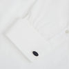 View 3 of product Turnbull & Asser's Navy Dotted Oval Cufflinks feature a silver finish and small white dots—ideal for adding a refined touch to any formal outfit. Shown here against a white background.