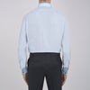 View 6 of product The Turnbull & Asser Light Blue Sea Island Quality Cotton Shirt features a T&A collar, double cuffs, white buttons, and a quality label inside the collar. Displayed on a plain white background.