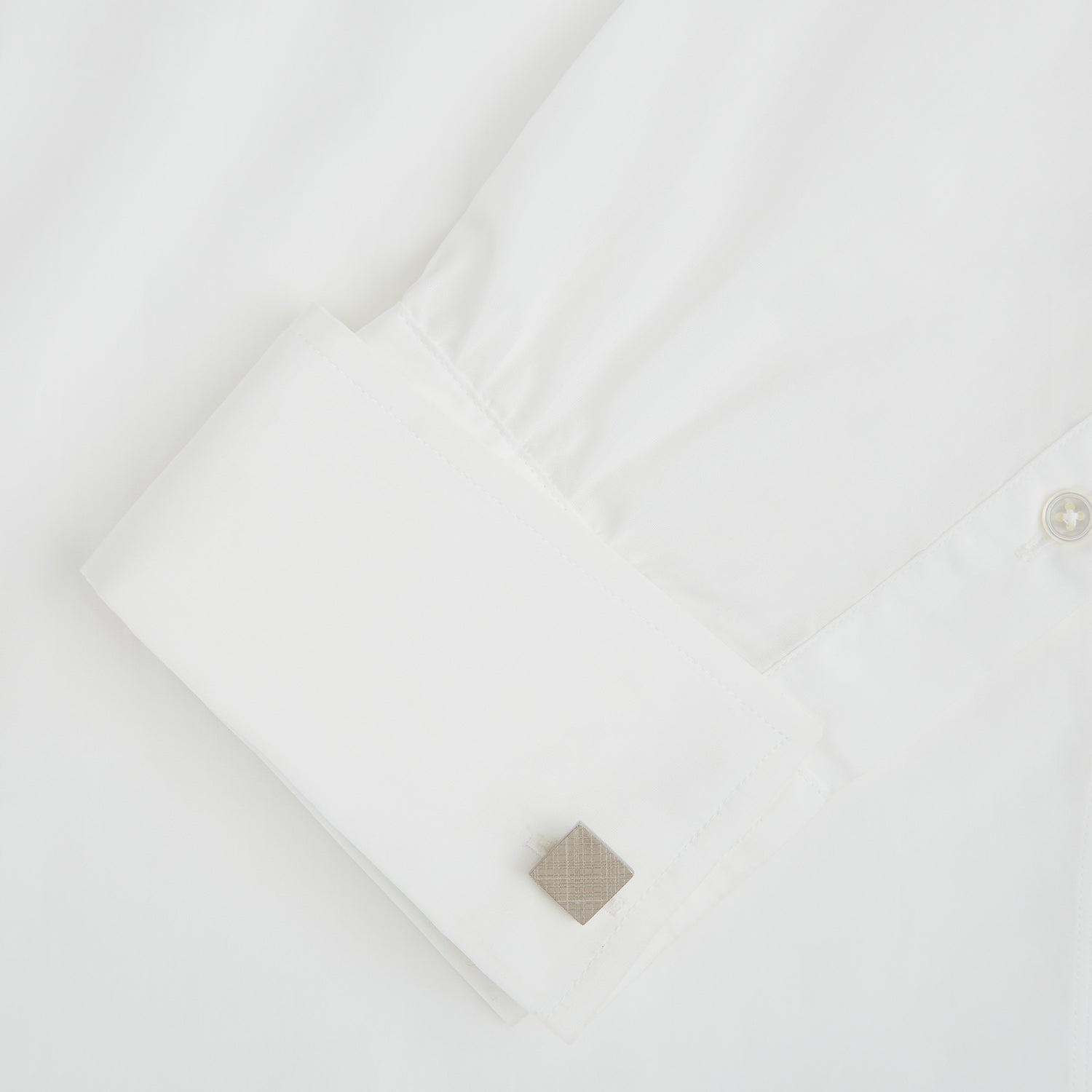 Image 3 of product Turnbull & Assers Silver Grid Square Cufflinks feature a geometric crisscross pattern, offering refined elegance and displayed against a white background.