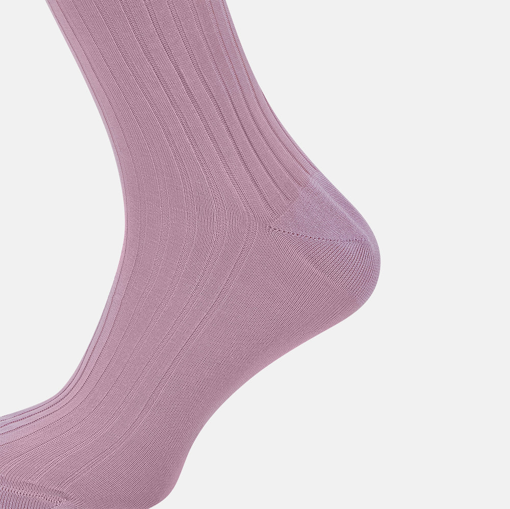 The Rose Mid-Length Socks by Turnbull & Asser are light purple, ribbed, mid-length socks made from mercerised Egyptian cotton with a hand-linked toe, shown against a plain white background.