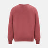 View 3 of product The Turnbull & Asser Antique Pink Merino V-Neck Jumper features ribbed cuffs, hem, and neckline in a soft antique pink, shown on a plain white background. Part of our knitwear collection.
