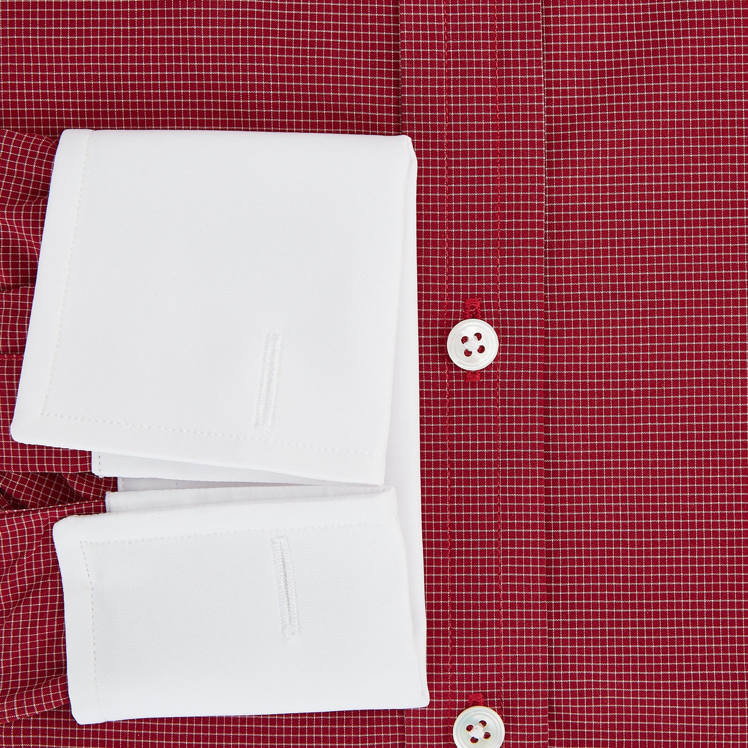Image 4 of product The Turnbull & Asser Dark Red Pin Check Shirt features a crisp white contrast collar and cuffs, with long sleeves and button-up design, shown against a white background.