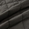 View 5 of product The Battersea Shadow Grey Quilted Jacket by Turnbull & Asser features a front zipper, buttoned cuffs, pointed collar, and multiple pockets—an ideal choice for the modern gentleman. Shown on a plain white background.
