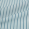 View 8 of product The GREEN DOUBLE STRIPE WESTMINSTER SHIRT by Turnbull & Asser features green and white vertical stripes, a pointed collar, buttoned cuffs, and a relaxed fit that highlights refined British craftsmanship.