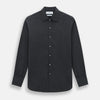 View 1 of product The Turnbull & Asser Midnight Blue Westminster Shirt features long sleeves, a button-up front, classic collar, and buttoned cuffs in a plain design—showcasing British craftsmanship—laid flat on a white background.