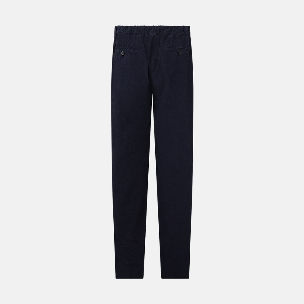 Turnbull & Asser's Light Navy Corduroy Miles Trousers feature a straight-leg stretch fit, elasticated waist, and matching fabric drawstring, shown on a plain white background.