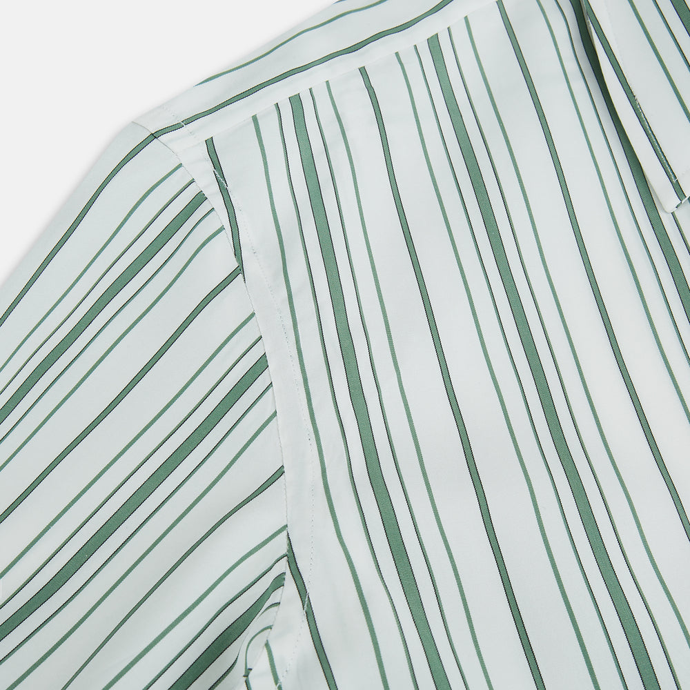 The SAGE GREEN MULTI STRIPE WESTMINSTER SHIRT by Turnbull & Asser features a classic collar, long sleeves, buttoned cuffs, relaxed fit, and vertical green and white stripes—embodying timeless British craftsmanship.