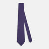 View 2 of product The Turnbull & Asser Purple Square and Circle Silk Tie is crafted from fine English silk, showcasing a purple design with a repeating geometric pattern of squares and circles for a refined, elegant look.