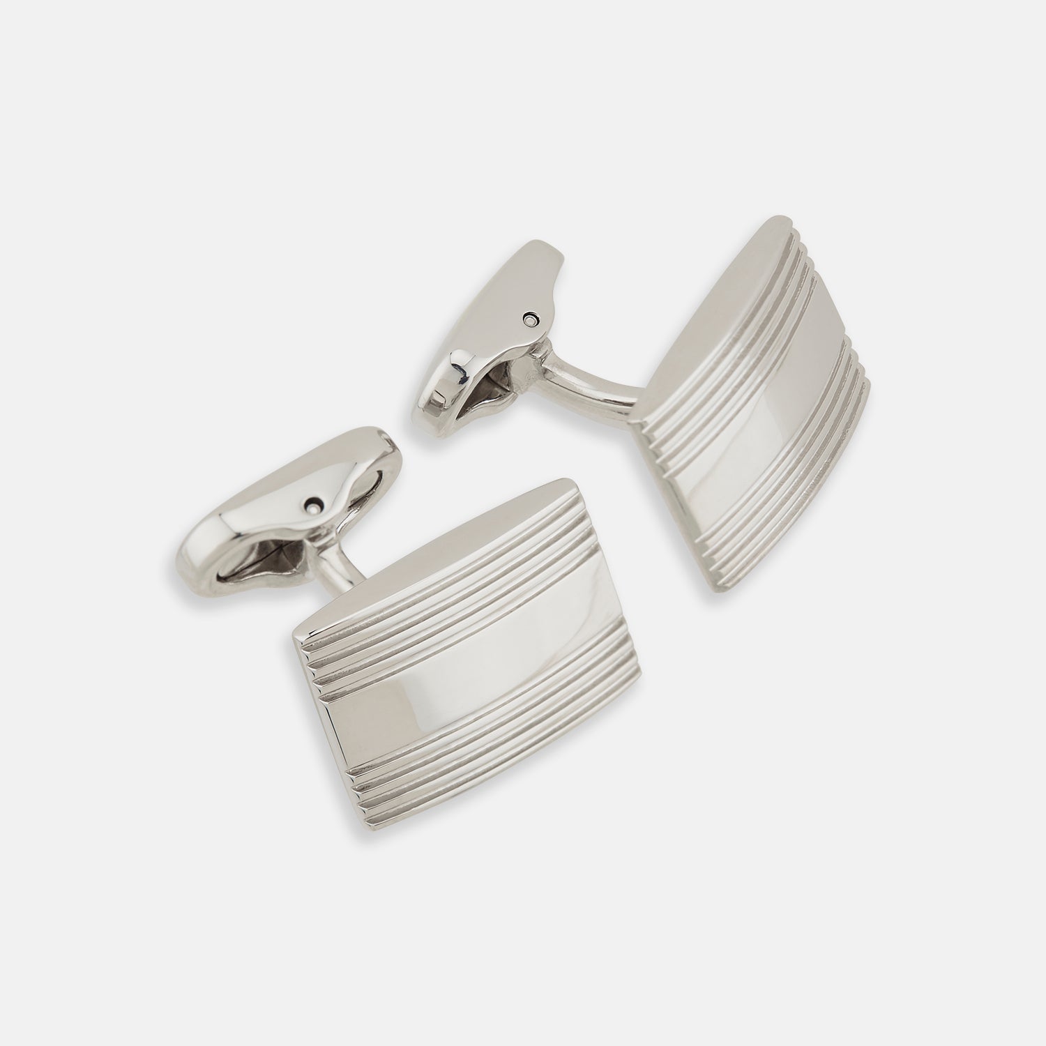 Image 1 of product Turnbull & Asser Silver Striped Rectangular Cufflinks feature a subtle horizontal engraved line pattern on the front, set against a white background.