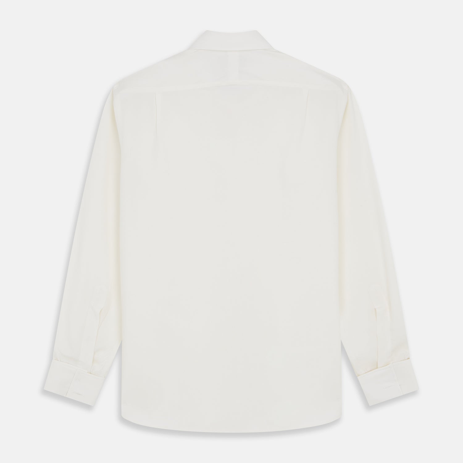 View 3 of product The Turnbull & Asser Cream Silk Tailored Fit Shirt is a long-sleeve button-up with a pointed collar and buttoned cuffs, displayed laid flat against a plain white background.