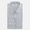 View 5 of product The Turnbull & Asser Navy Multi Check Mayfair Shirt is made from pure cotton with a blue and white check pattern, long sleeves, pointed collar, and buttoned cuffs, shown against a white background.