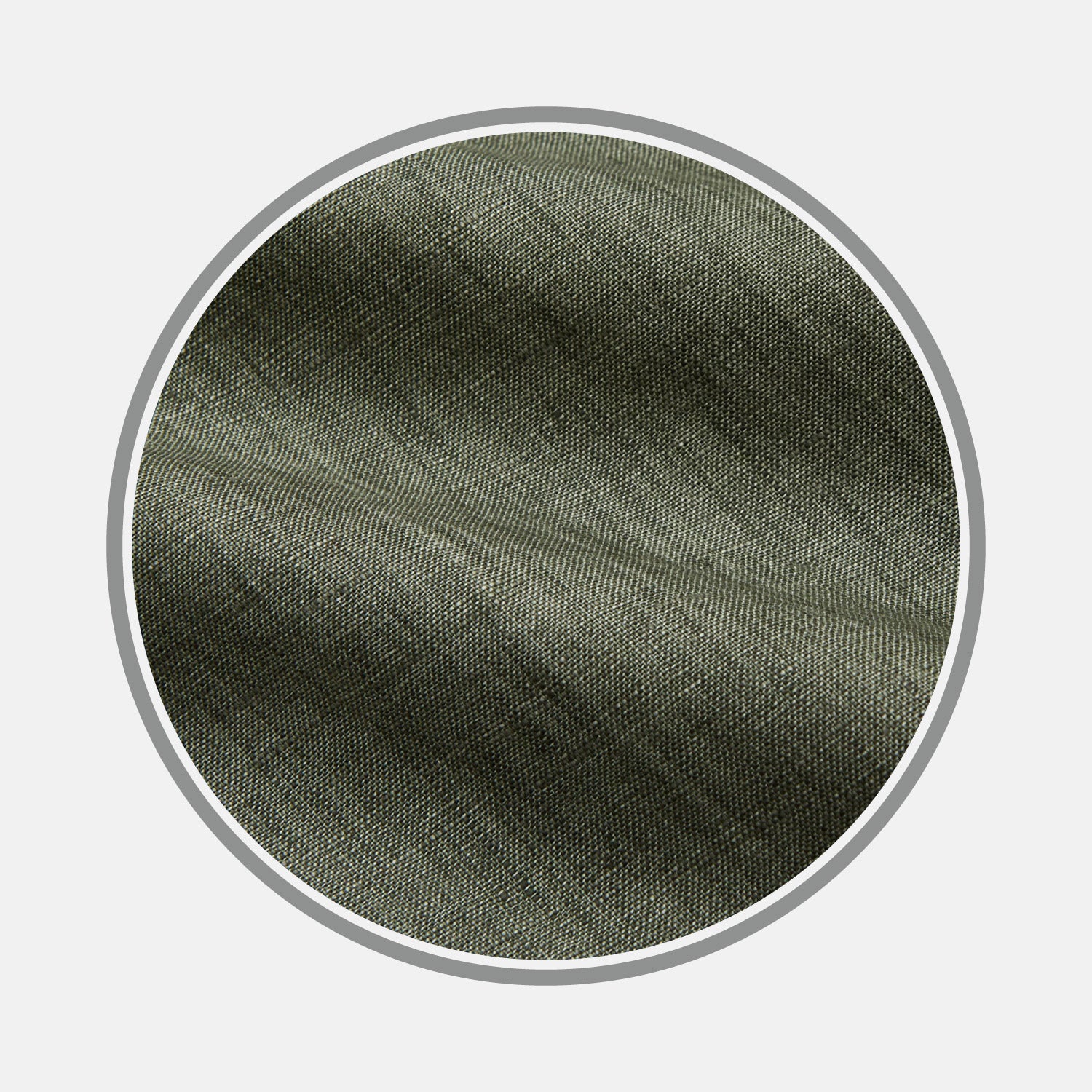 View 1 of product Close-up of Turnbull & Asser’s Sage Green Plain Linen Fabric, highlighting its fine diagonal weave within a circular frame on a white background.