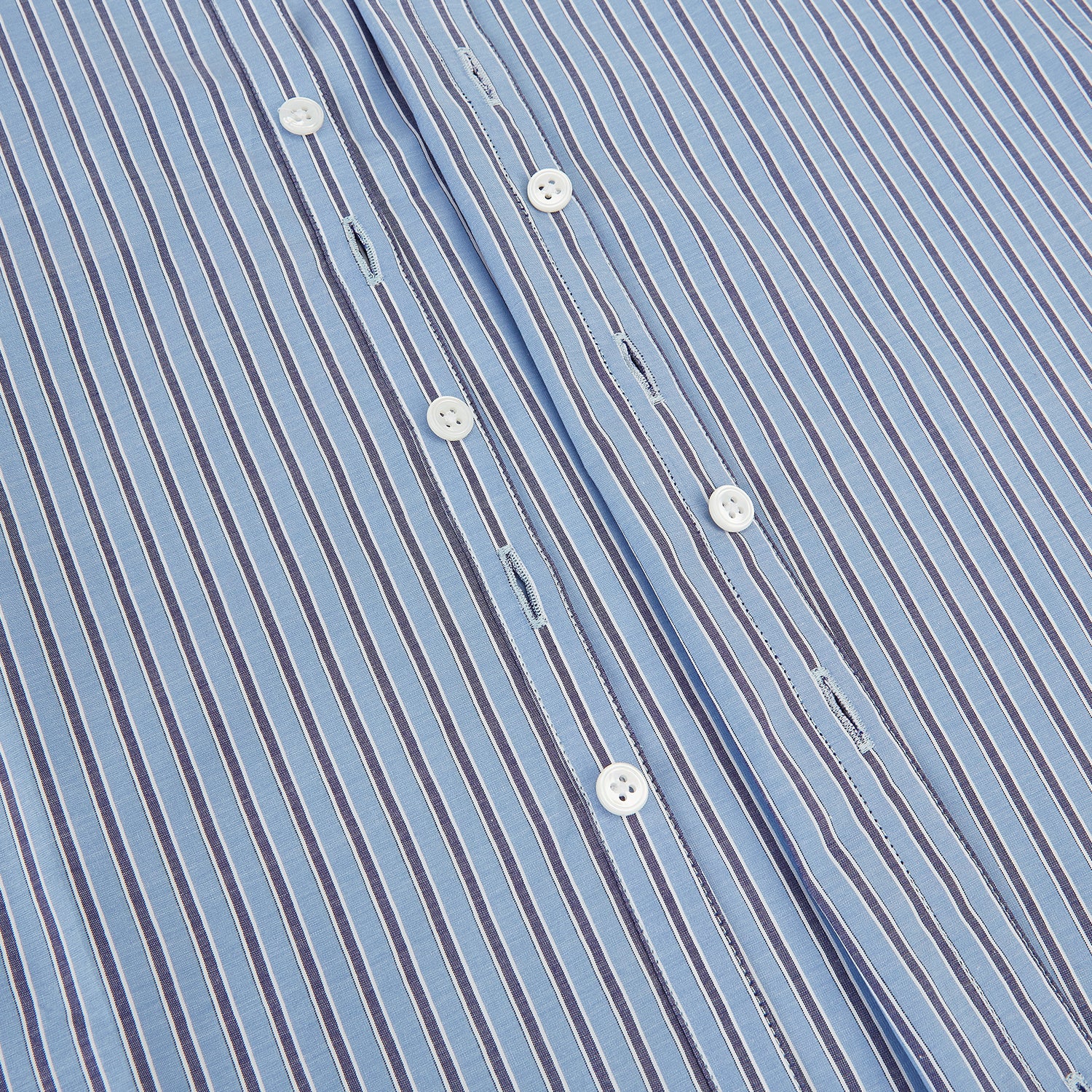 View 7 of product The Steel Blue Ticking Stripe Westminster Shirt by Turnbull & Asser features a classic fit, Turnbull collar, vertical stripes, white buttons, and buttoned cuffs—showcasing refined British craftsmanship.