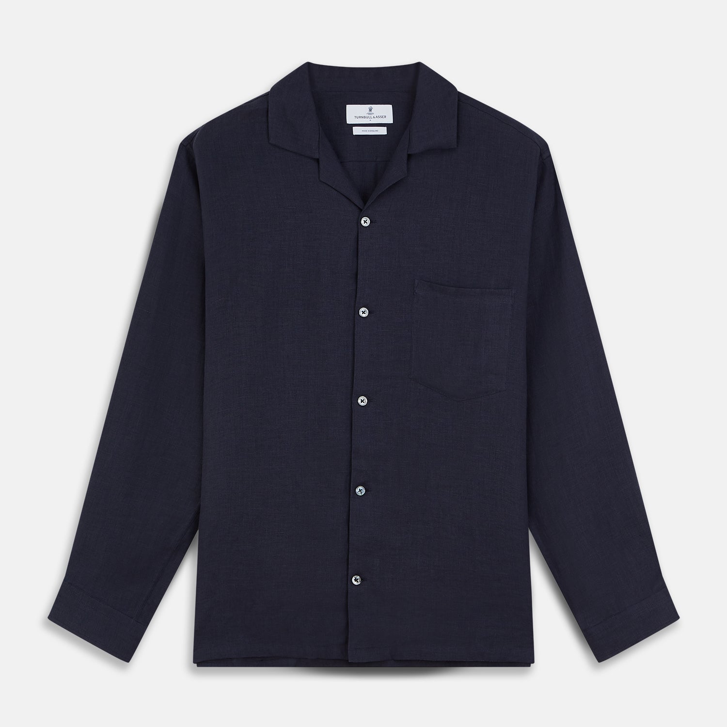 View 2 of product A close-up of Turnbull & Asser's Plain Navy Hemp Cotton Fabric displays its subtle texture within a circular gray-bordered frame on a white background.