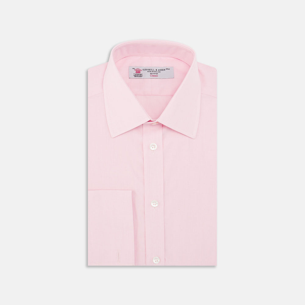 The Pink End-on-End Shirt with T&A Collar and Double Cuffs by Turnbull & Asser, shown neatly folded on a white background, updates timeless elegance with its classic detailing and refined pink hue.