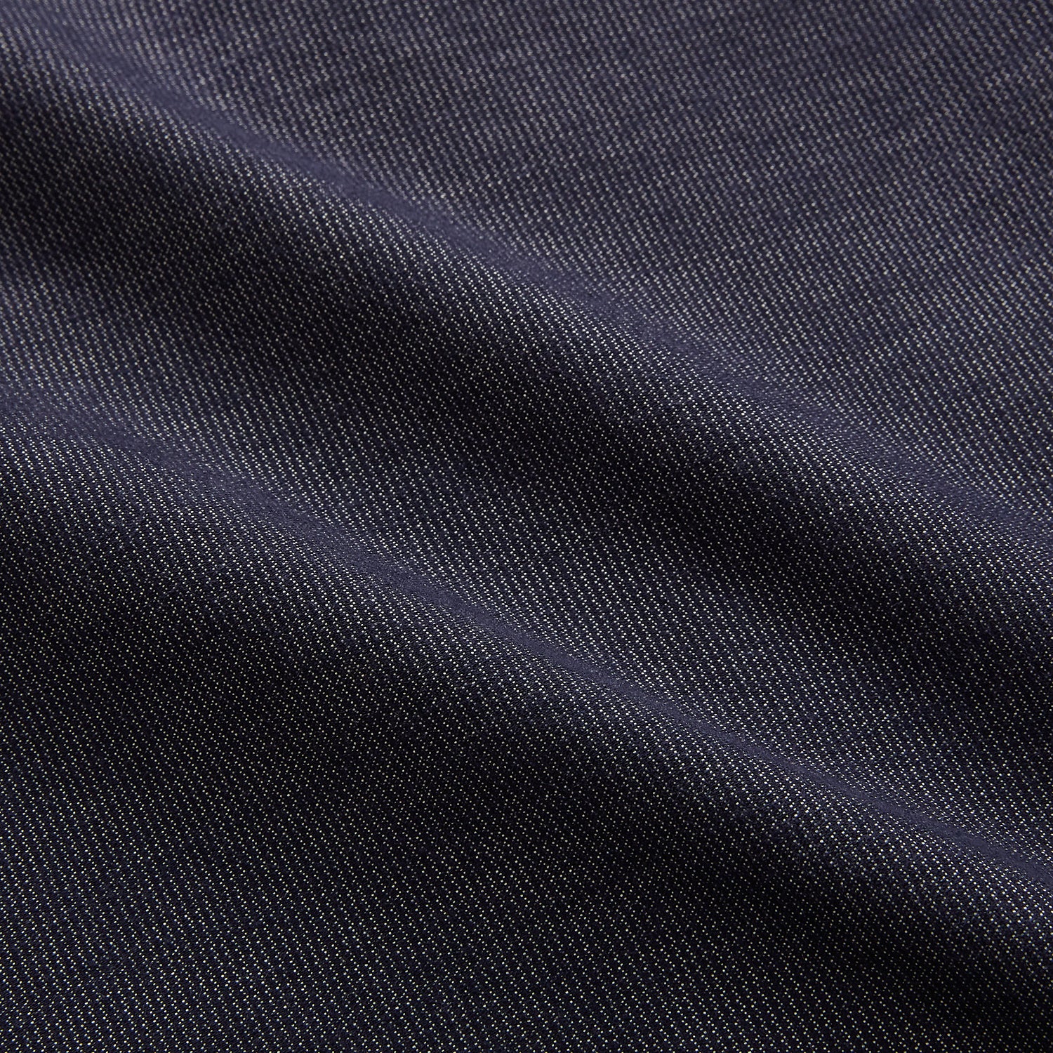 View 6 of product The Turnbull & Asser Navy Hampstead Overshirt features a collar, left chest pocket, two zippered pockets near the bottom, and a classic long-sleeve button-up design, shown laid flat on a white background.