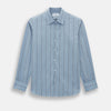 View 1 of product The Steel Blue Track Stripe Westminster Shirt by Turnbull & Asser features dark pinstripes, a classic collar, white buttons, and buttoned cuffs—expertly crafted to highlight British craftsmanship. Laid flat on white background.