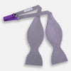 View 2 of product The Turnbull & Asser Purple and White Houndstooth Silk Bow Tie, ideal for formalwear, is shown against a white background.