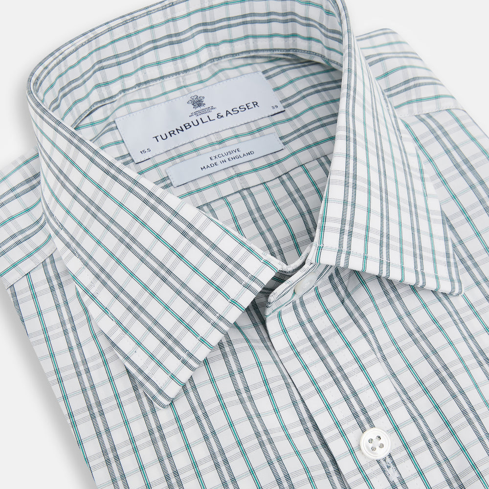 The Turnbull & Asser Sage Green Multi Check Mayfair Shirt is a long-sleeved, button-up shirt with a spread collar, crafted from premium Italian cotton and displayed on a white background.