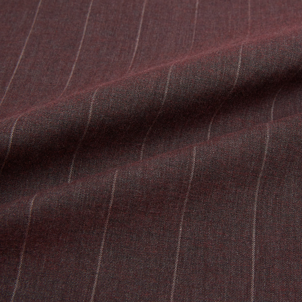 The Indies Red Wide Stripe Westminster Shirt by Turnbull & Asser features wide red stripes, a classic collar, and a tailored fit, reflecting British craftsmanship. Displayed against a white background.