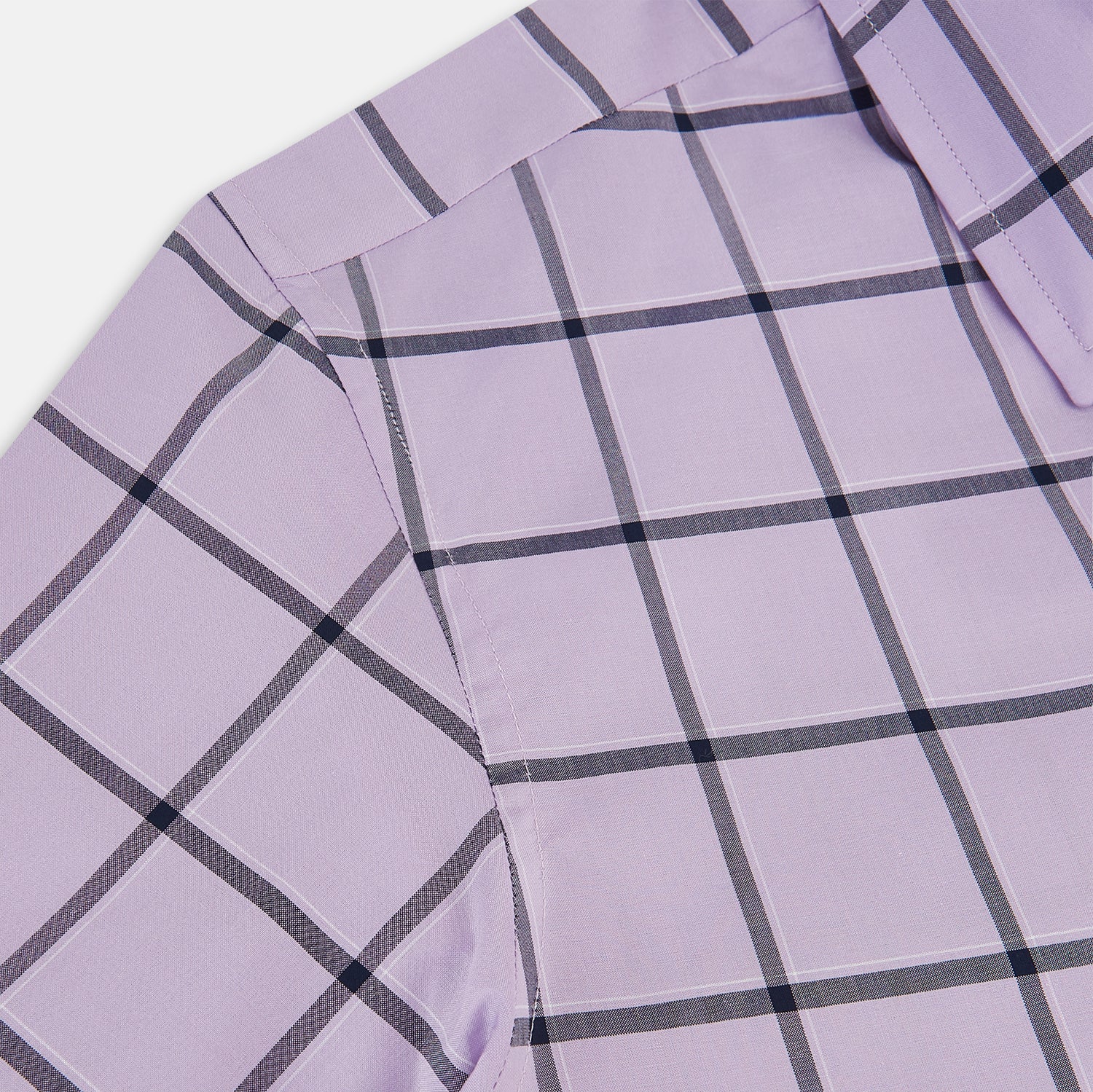 Image 6 of product A long-sleeve, button-up Lilac Grid Check Windsor Shirt by Turnbull & Asser, featuring a black windowpane pattern and a refined Windsor collar, displayed on a plain white background.