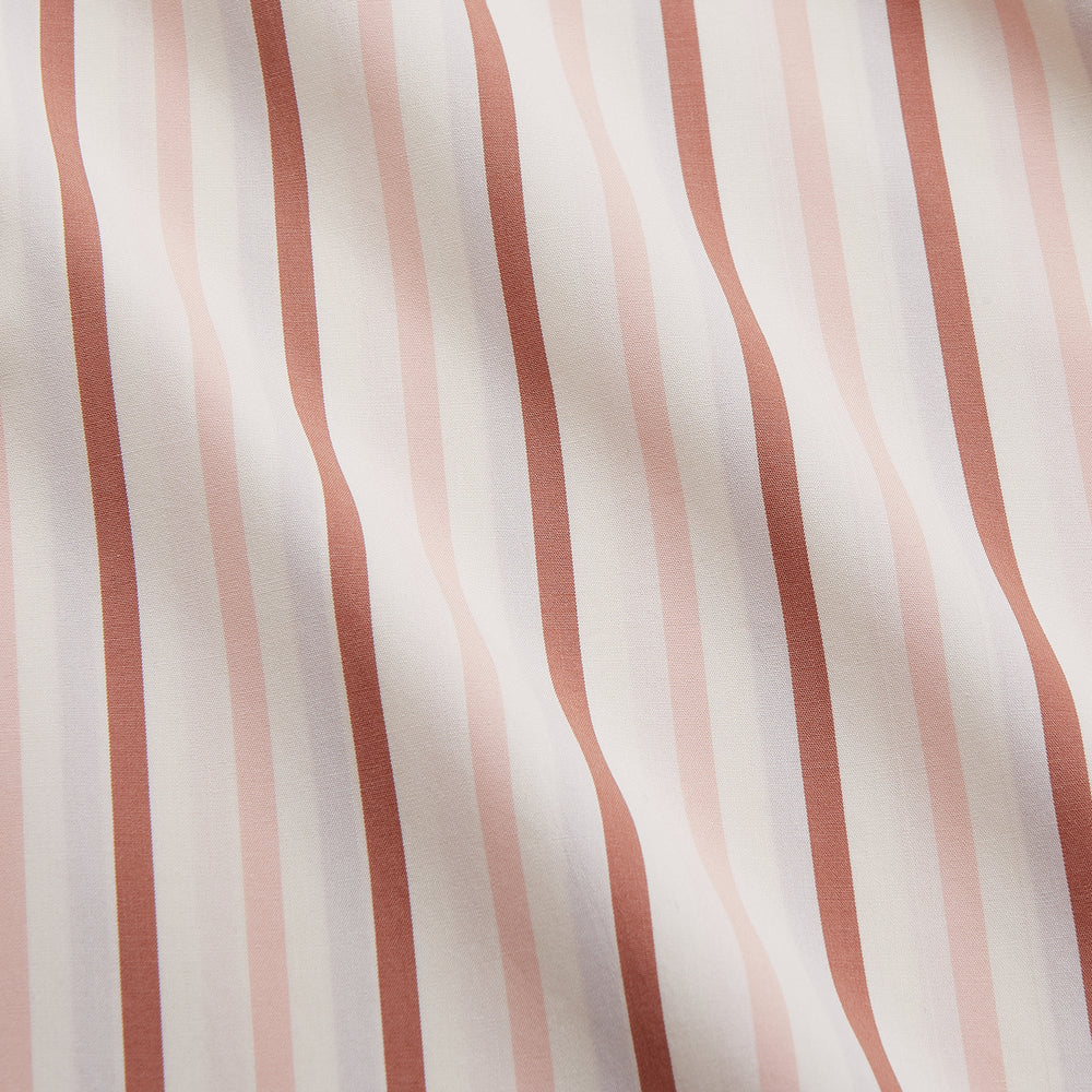 The Pink and Sandstone Stripe Cotton Regular Fit Mayfair Shirt by Turnbull & Asser features vertical pink and sandstone stripes on white, a T&A collar, wide cuffs, and a slightly curved hem for refined detail.