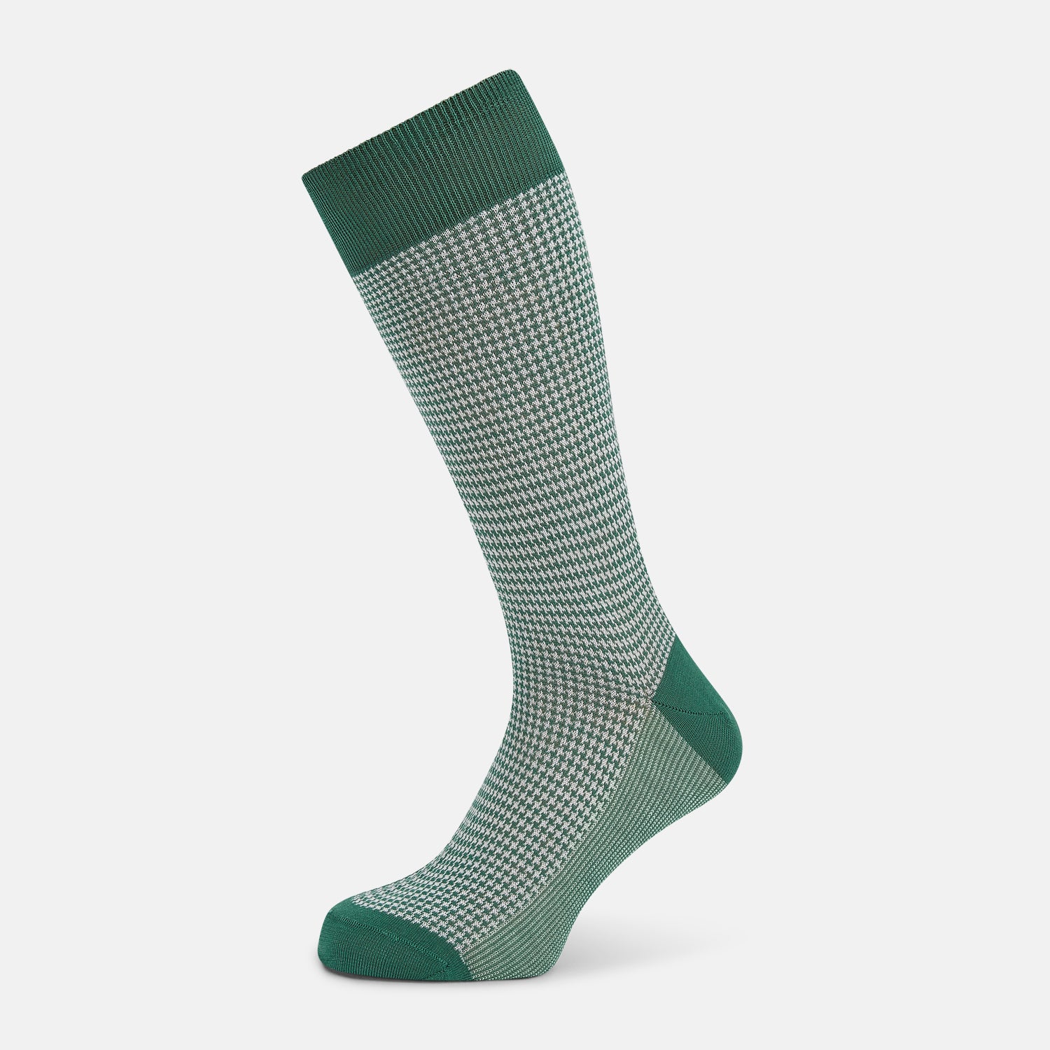 View 1 of product The Turnbull & Asser Ivory Houndstooth Mid-Length Sock features a green and white houndstooth pattern with solid green cuff, heel, and toe accents. Displayed on a plain white background.