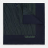 View 1 of product The Navy and Fern Green Stripe Silk Pocket Square by Turnbull & Asser features green vertical and diagonal stripes, hand-rolled edges, and "TURNBULL & ASSER HAND PRINTED IN ENGLAND" printed in one corner.