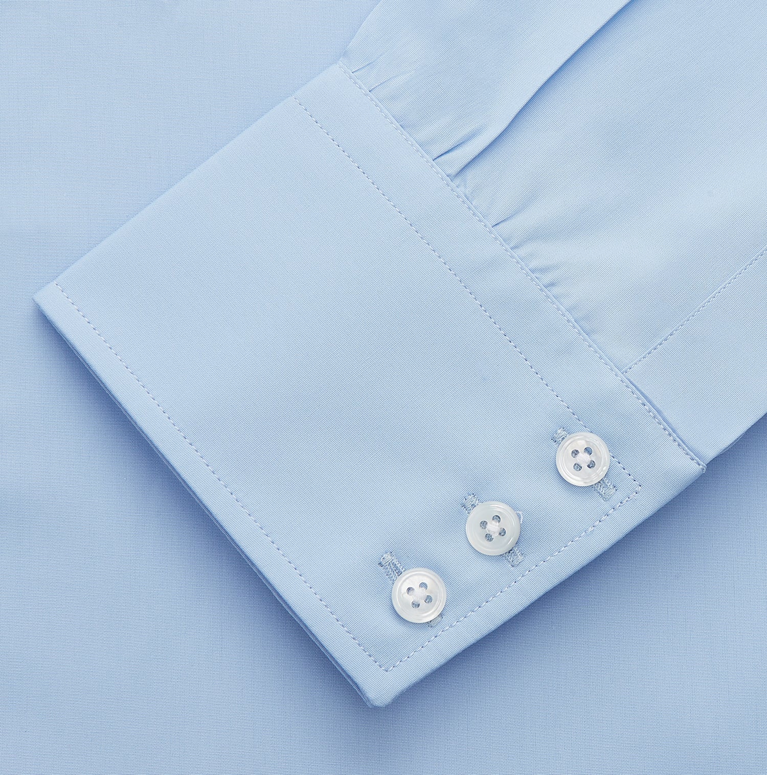 View 4 of product The Turnbull & Asser Pale Blue Organic Cotton Regular Fit Mayfair Shirt features buttons and is crafted from soft, comfortable organic cotton.