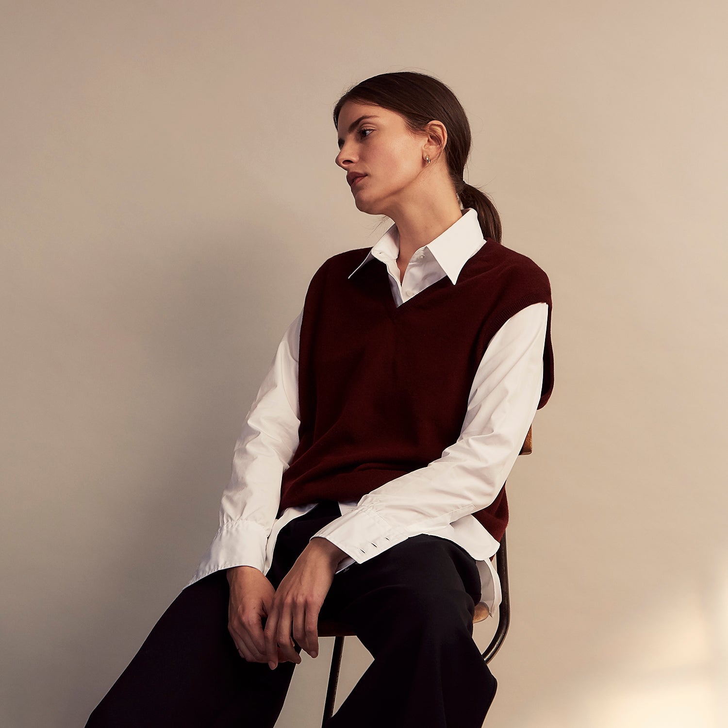 View 10 of product The White Cotton Tailored Bianca Shirt by Turnbull & Asser features a pointed collar and button cuffs, crafted from soft organic cotton and displayed flat on a white background for timeless elegance.