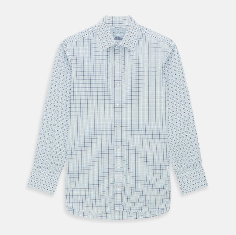 The Blue Overlay Grid Check Mayfair Shirt by Turnbull & Asser features a light blue and white grid check pattern with long sleeves and button-up design, making it a versatile wardrobe staple. Displayed on a plain white background.