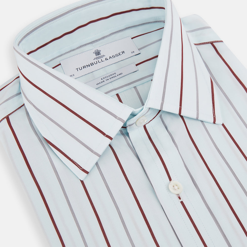 The Turnbull & Asser Burgundy Combination Stripe Mayfair Shirt features long sleeves, a classic T&A collar, and vertical black and burgundy stripes on white, laid flat against a plain white background.