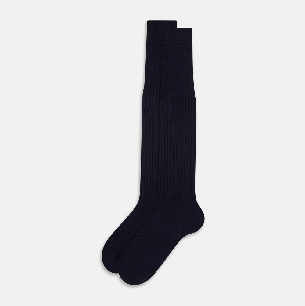 A single navy long sock by Turnbull & Asser, featuring a subtle ribbed texture and crafted from soft Egyptian cotton, displayed on a plain white background.