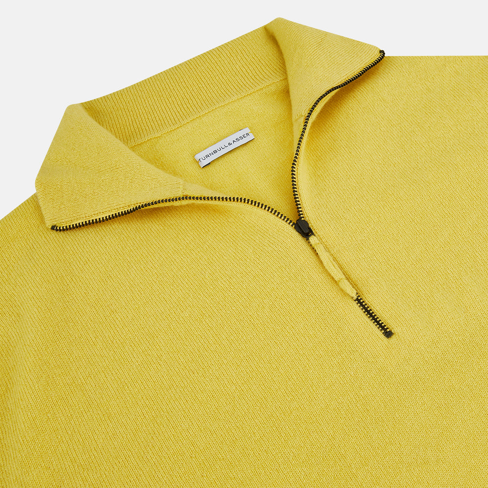 The Turnbull & Asser Canary Yellow Half-Zip Cashmere Jumper features a high collar and front half-zip closure, shown against a white background.