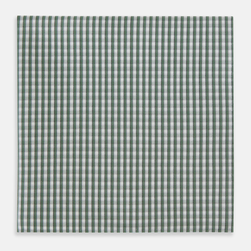 The Turnbull & Asser Melon Green Micro Shadow Check Hand-Rolled Handkerchief is displayed flat against a white background, showcasing its green and white check pattern and expertly hand-rolled edges.