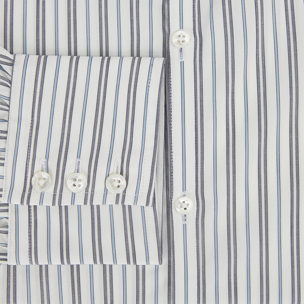 The Turnbull & Asser Navy and Light Blue Multi Track Stripe Westminster Shirt, featuring a button-up design with long sleeves and a signature collar, is displayed flat to highlight its expert British craftsmanship.