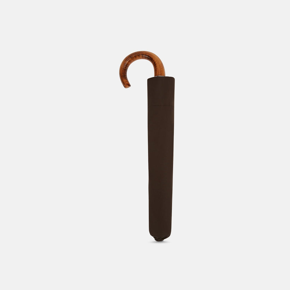 The Turnbull & Asser Brown Telescopic Umbrella features a brown maple crook handle and a metal shaft, shown open against a plain white background.