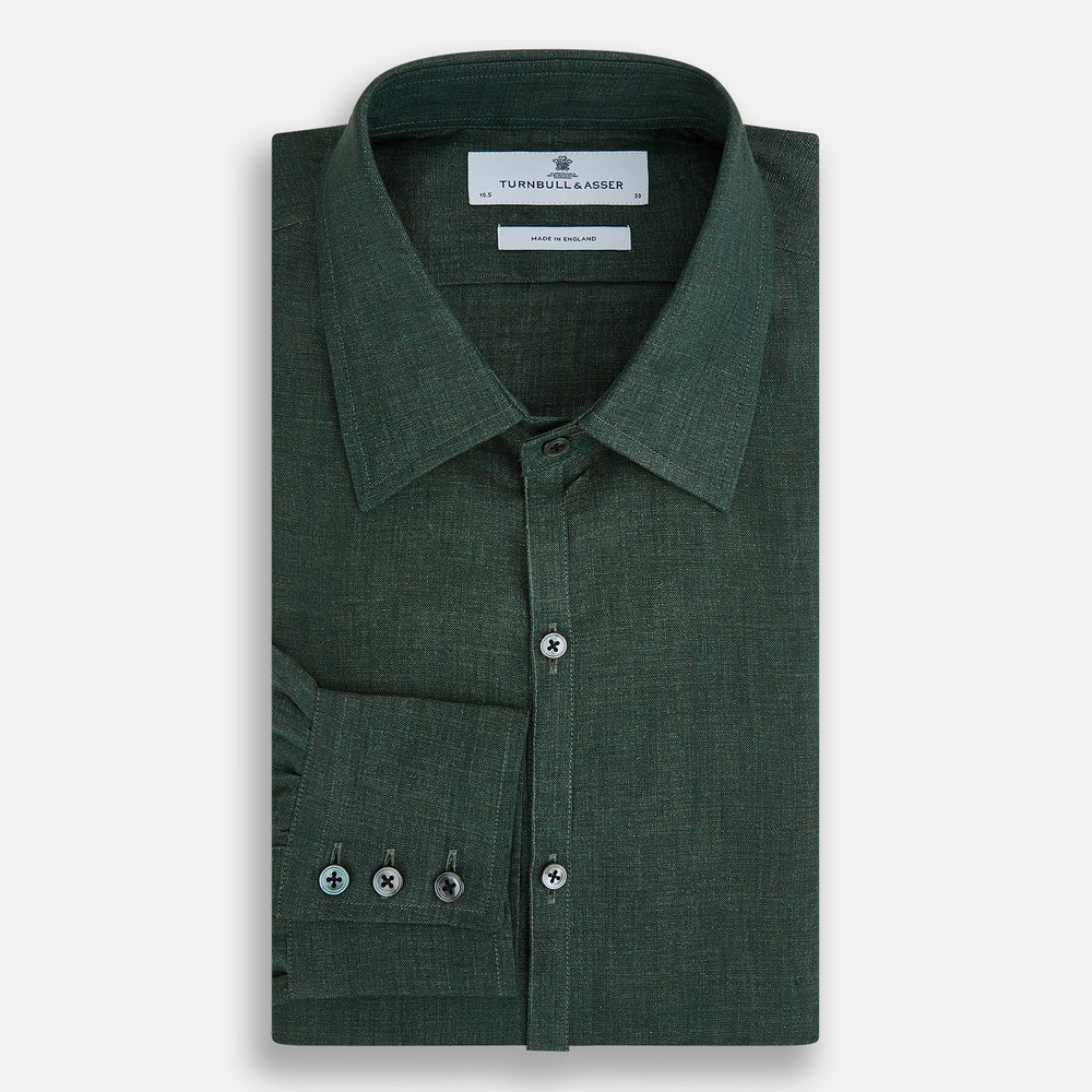 The Forest Green Linen Westminster Shirt by Turnbull & Asser features long sleeves, a Turnbull collar, and a button-up design, shown laid flat on a white background.